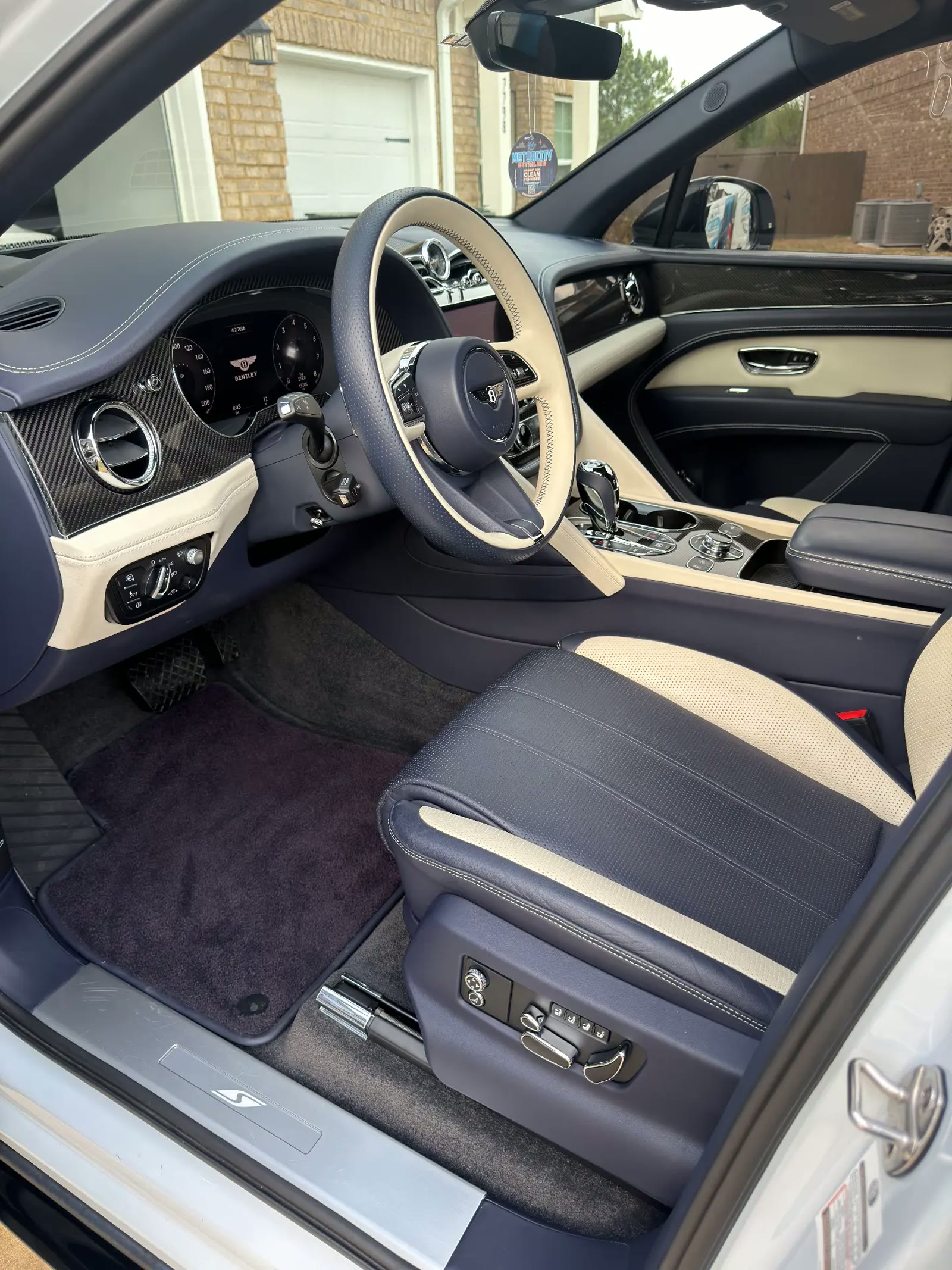 Bentley Bentayga blue leather cockpit cleaned during a Motorcity Detail package