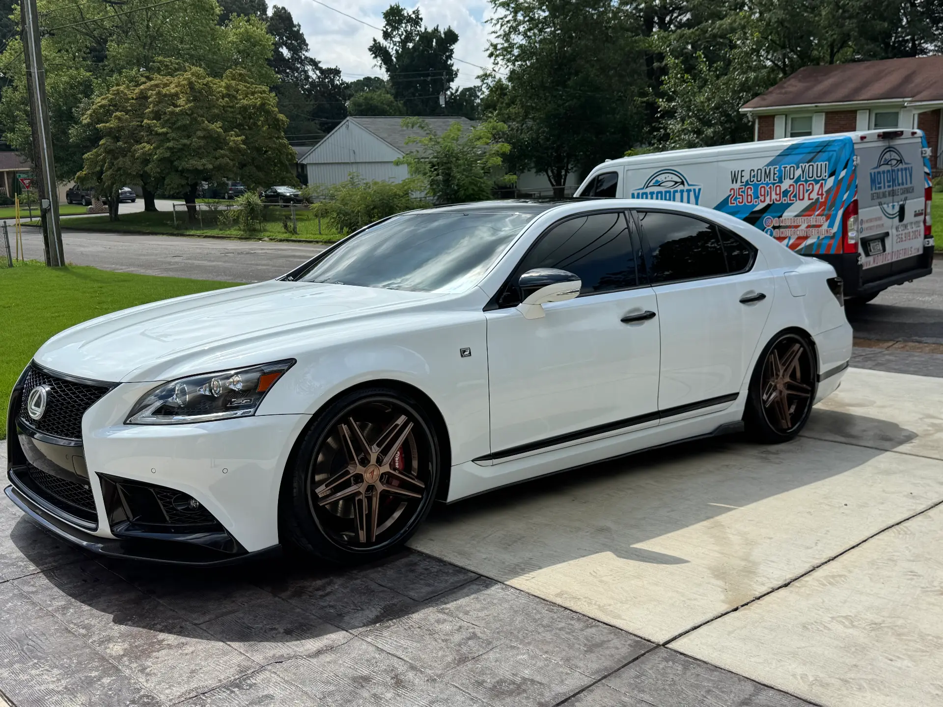 Black Lexus LS sedan with a coated, high-gloss finish