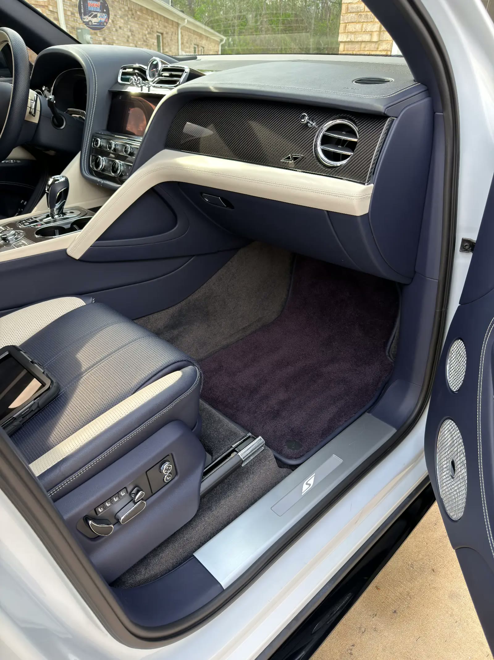 Bentley Bentayga blue leather passenger interior and floor mats after a Motorcity Detail package