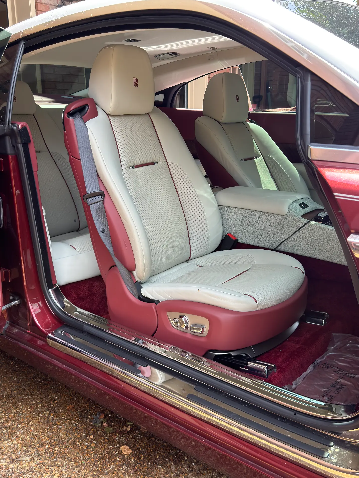 Cream leather front seating in a Rolls-Royce Wraith after an interior detail